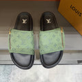 Louis Vuitton Light Green Patterned Slide Sandals — hero