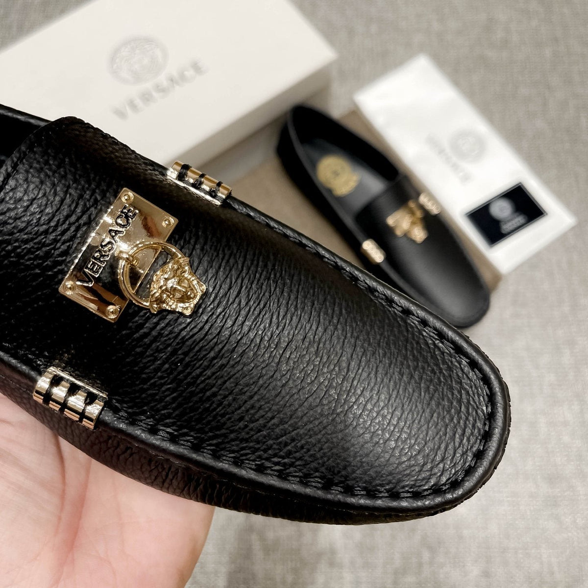 Versace Men's Black Loafers with Gold-Tone Hardware — detail
