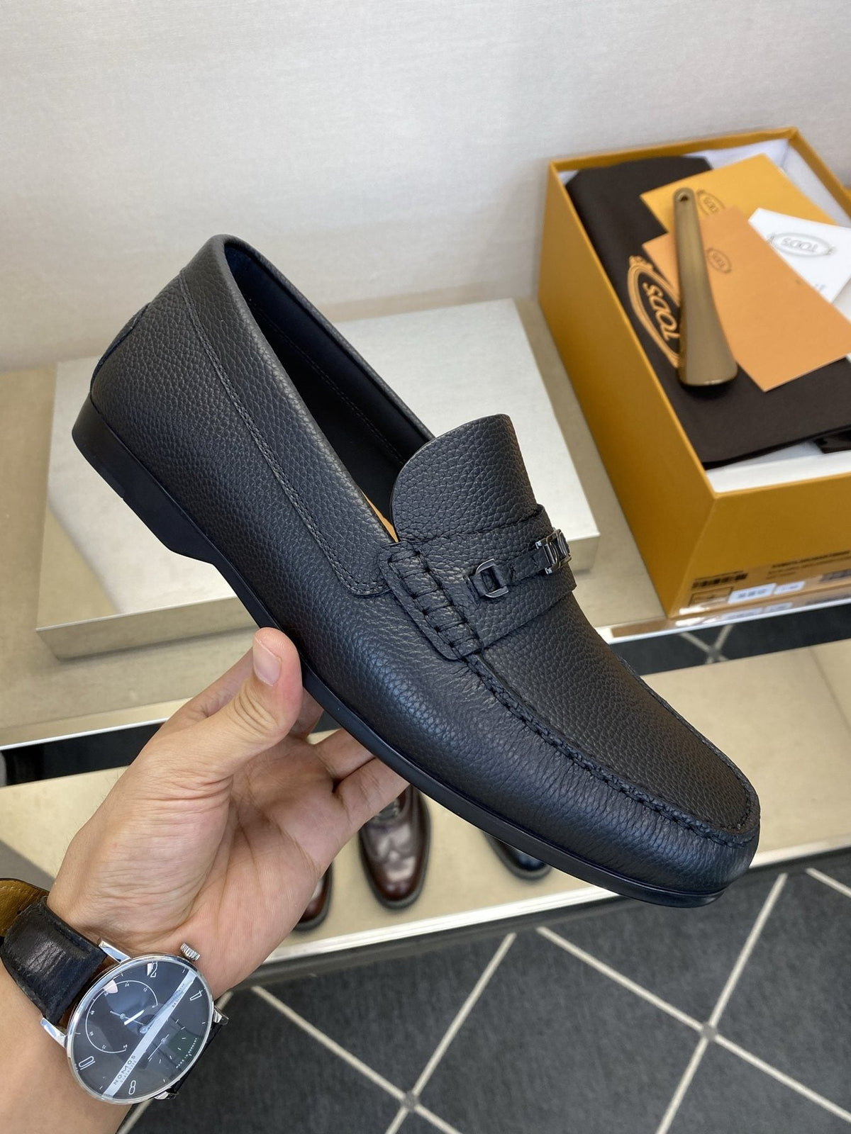 Tod's Black Leather Penny Loafers — side