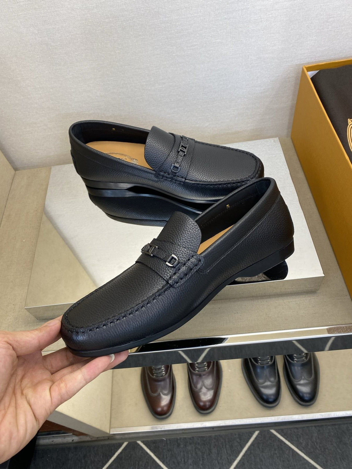 Tod's Black Leather Penny Loafers — side