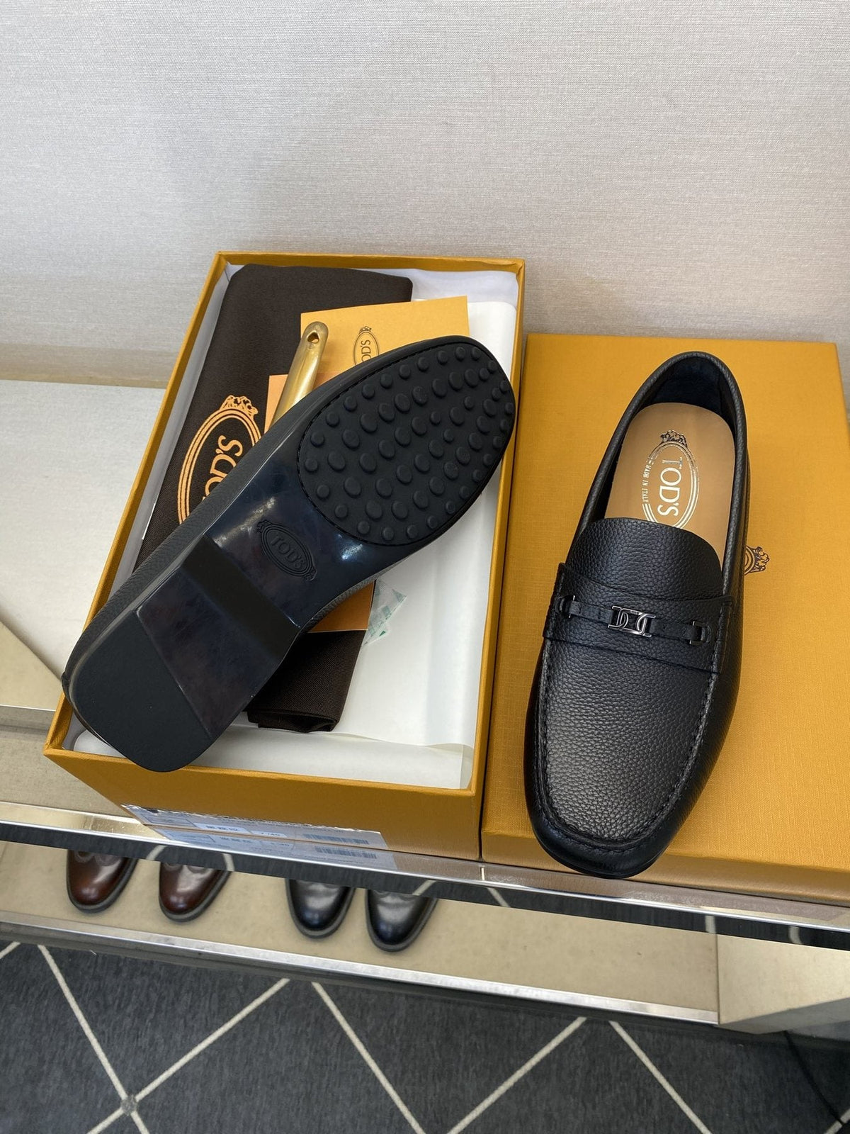 Tod's Black Leather Penny Loafers — side