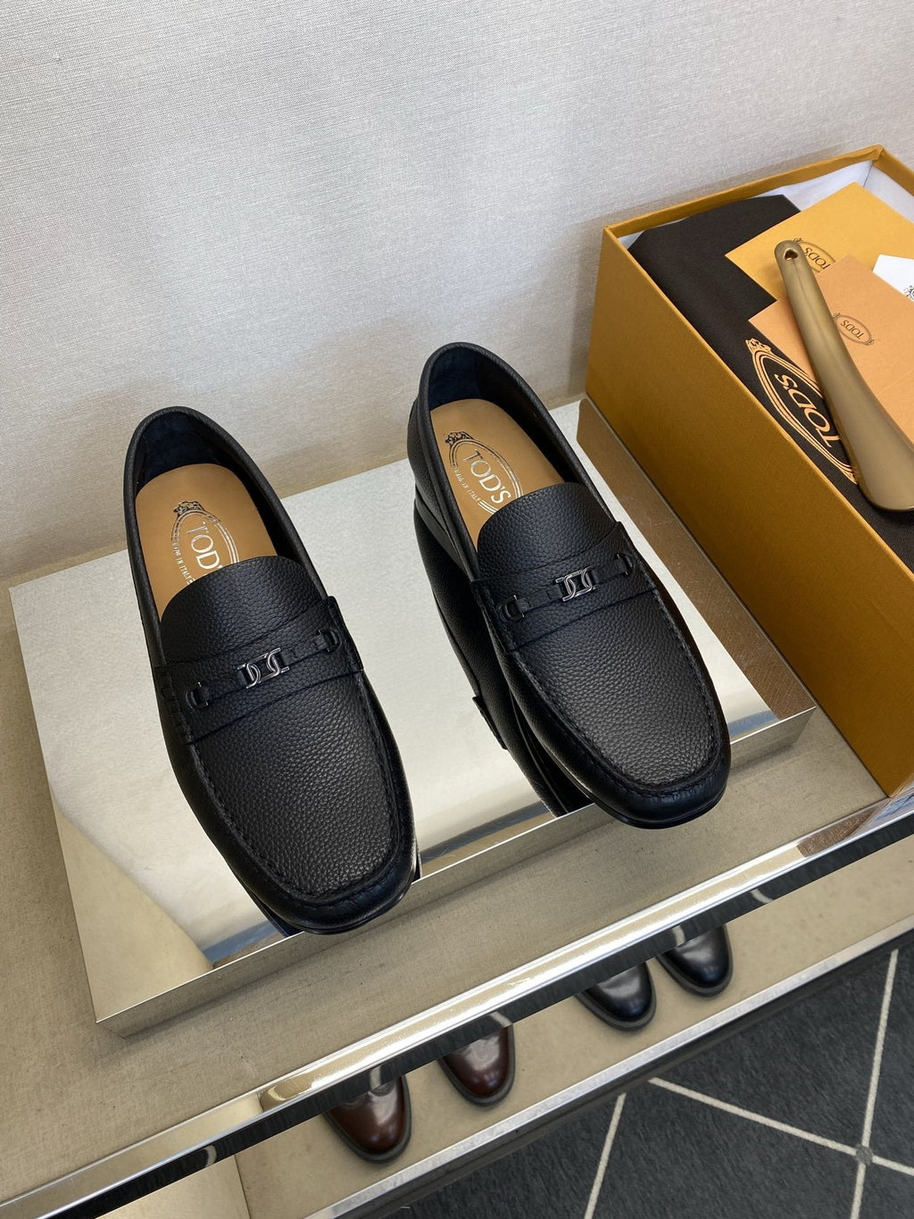 Tod's Black Leather Penny Loafers — hero
