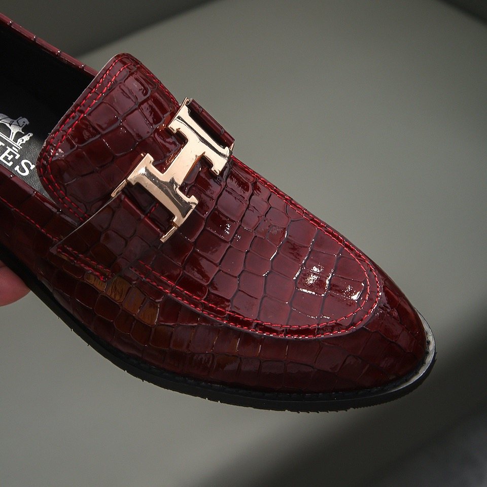Hermès Burgundy Crocodile-Pattern Loafers — detail