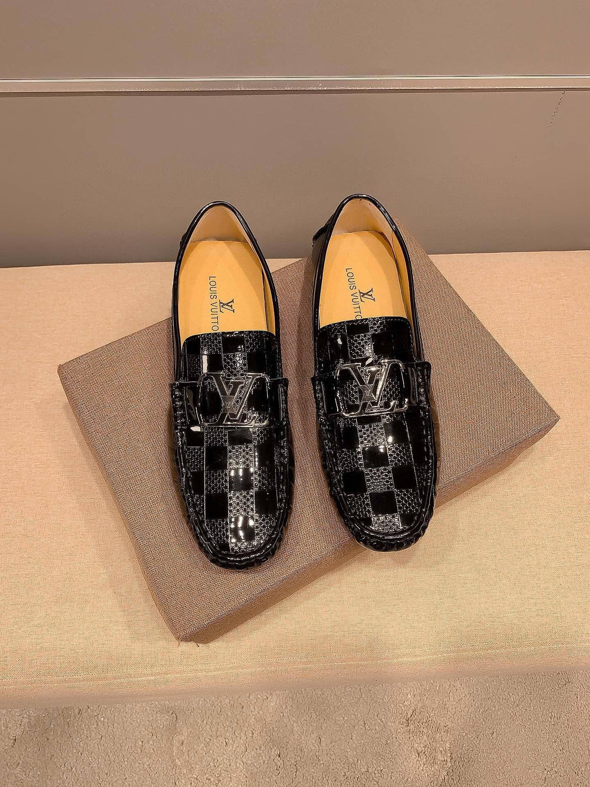 Louis Vuitton Black Glossy Buckle Loafers — hero