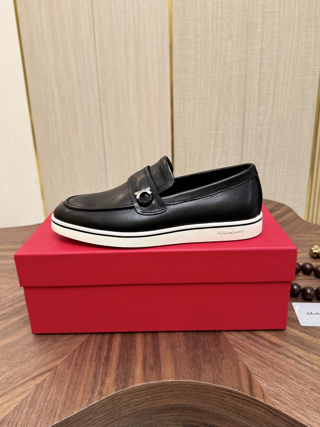 Salvatore Ferragamo Black Loafers with White Soles — side