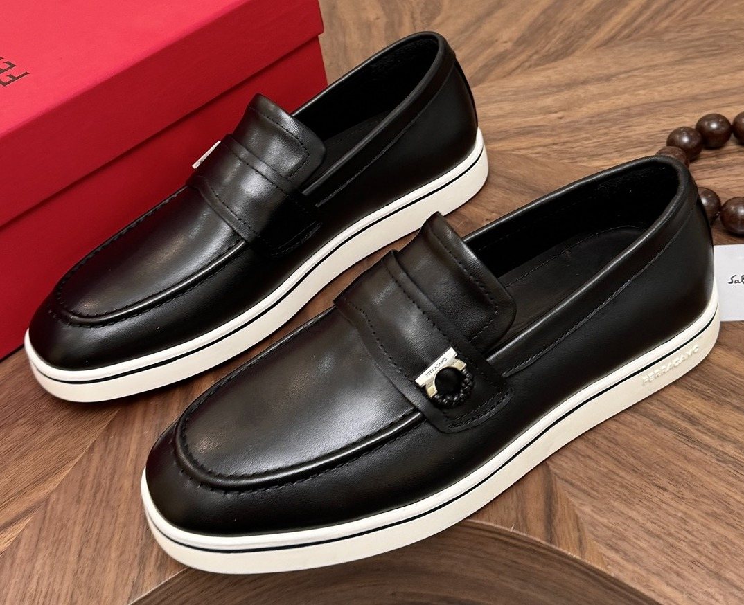Salvatore Ferragamo Black Loafers with White Soles — hero