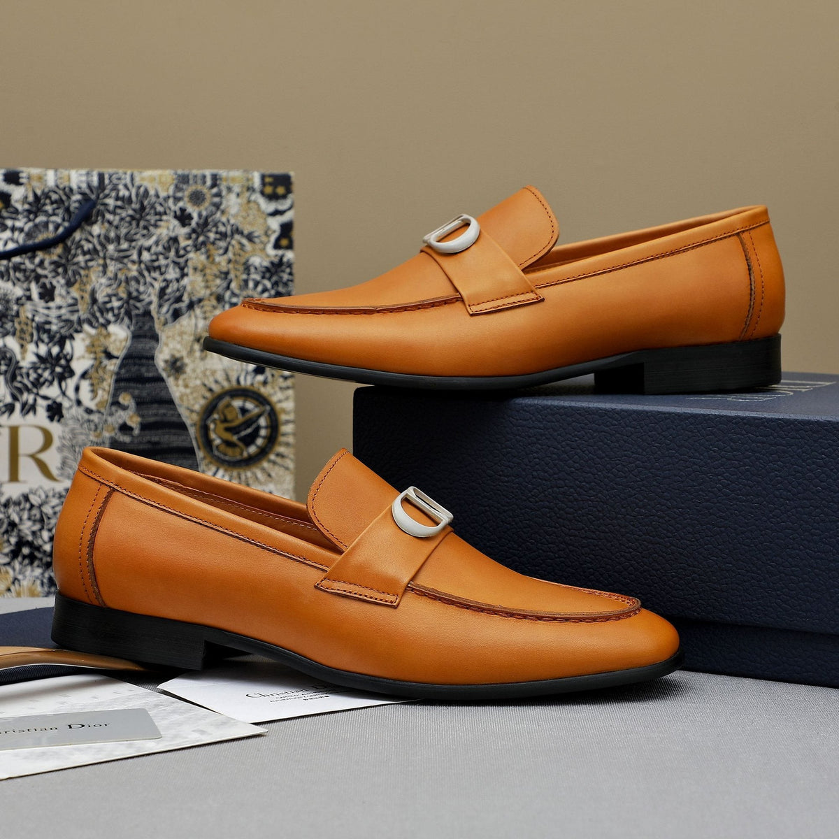 Dior Tan Leather Buckle Loafers — hero