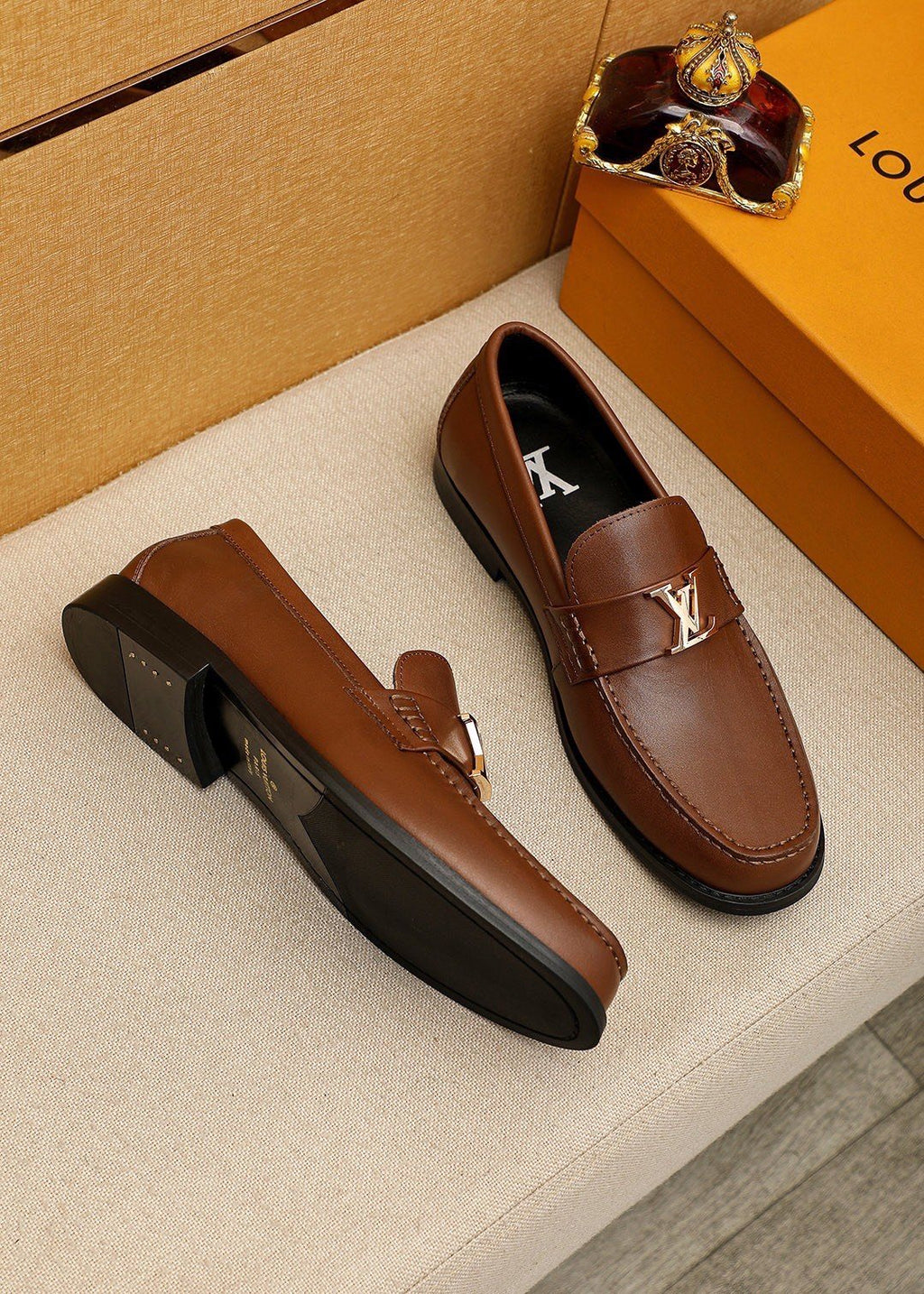 LOUIS VUITTON Brown Metal Hardware Loafers — front