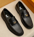 Louis Vuitton Black Textured Hardware Loafers — hero