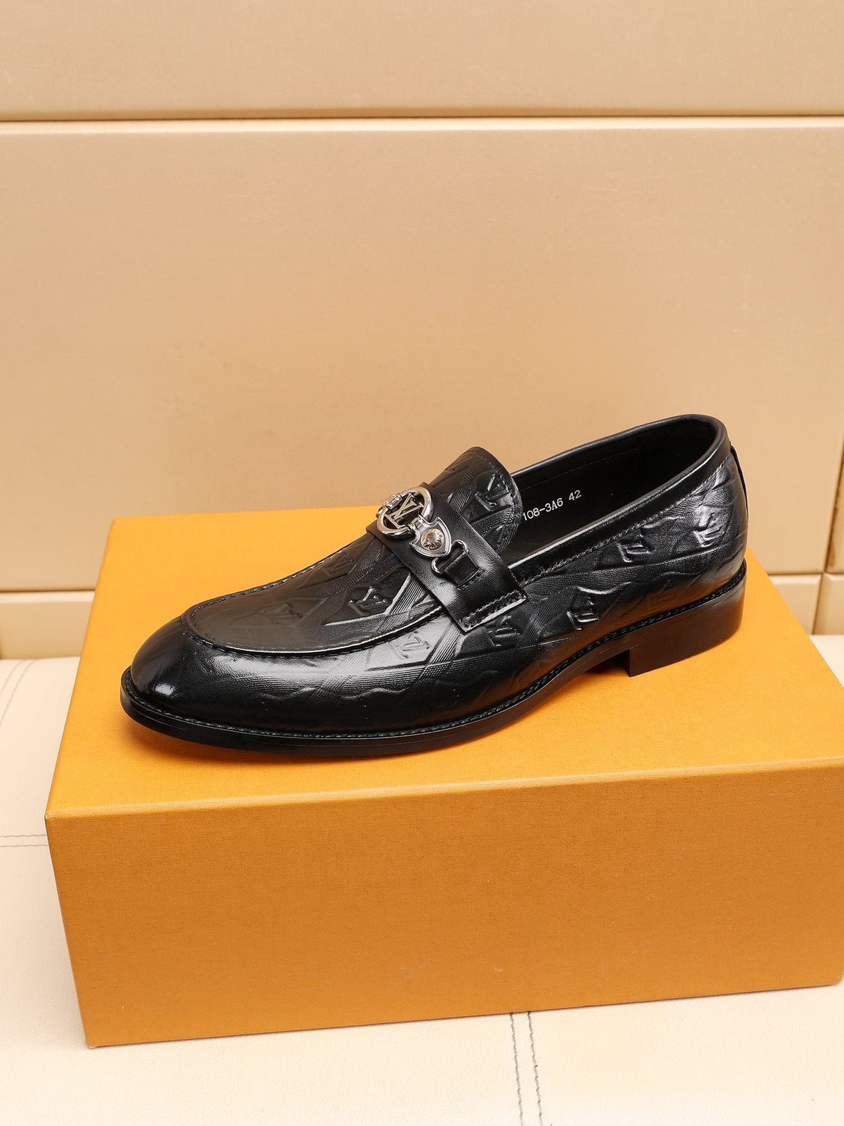 Louis Vuitton Black Embossed Loafers — side