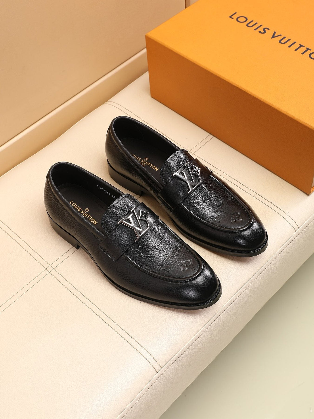 Louis Vuitton Black Embossed Loafers — front