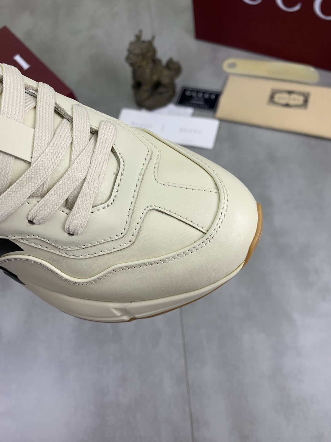 Gucci Cream Chunky Sneakers with Black Accents — detail