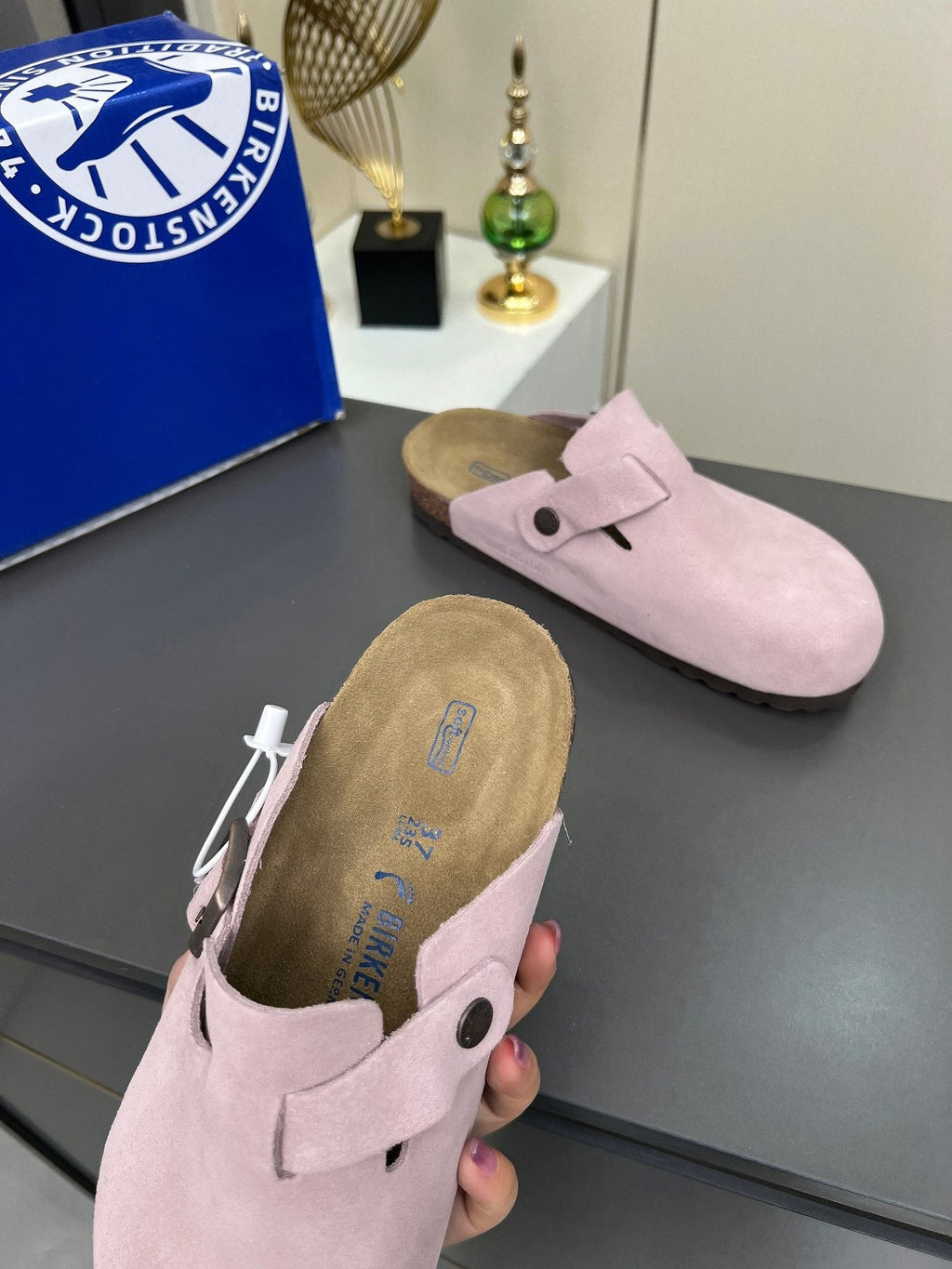 Birkenstock Light Pink Buckle Clogs — detail