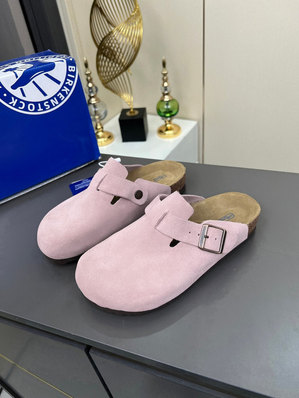 Birkenstock Light Pink Buckle Clogs — hero