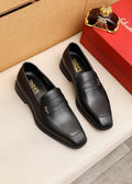 Ferragamo Black Metal Accent Loafers — hero