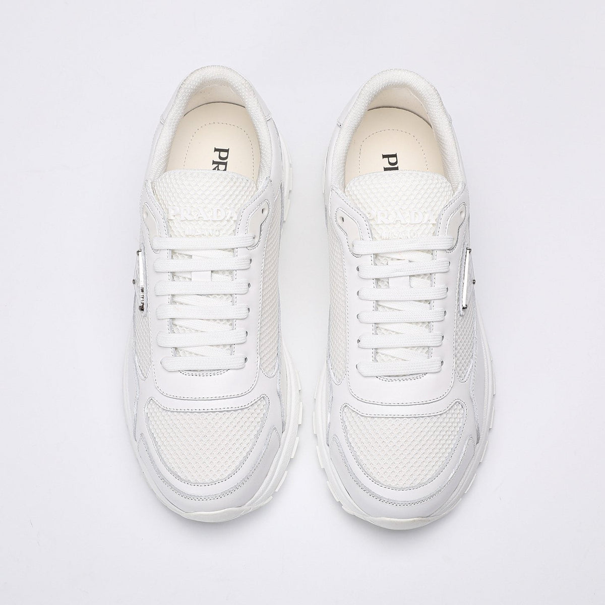 Prada White Leather Low-Top Sneakers — front