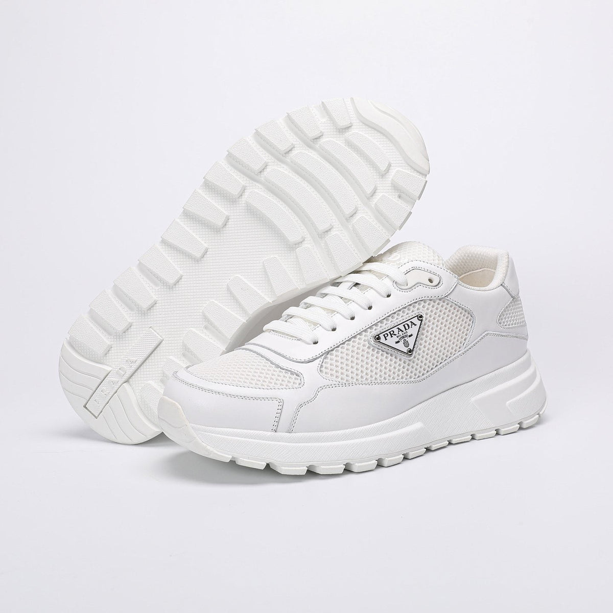 Prada White Leather Low-Top Sneakers — front