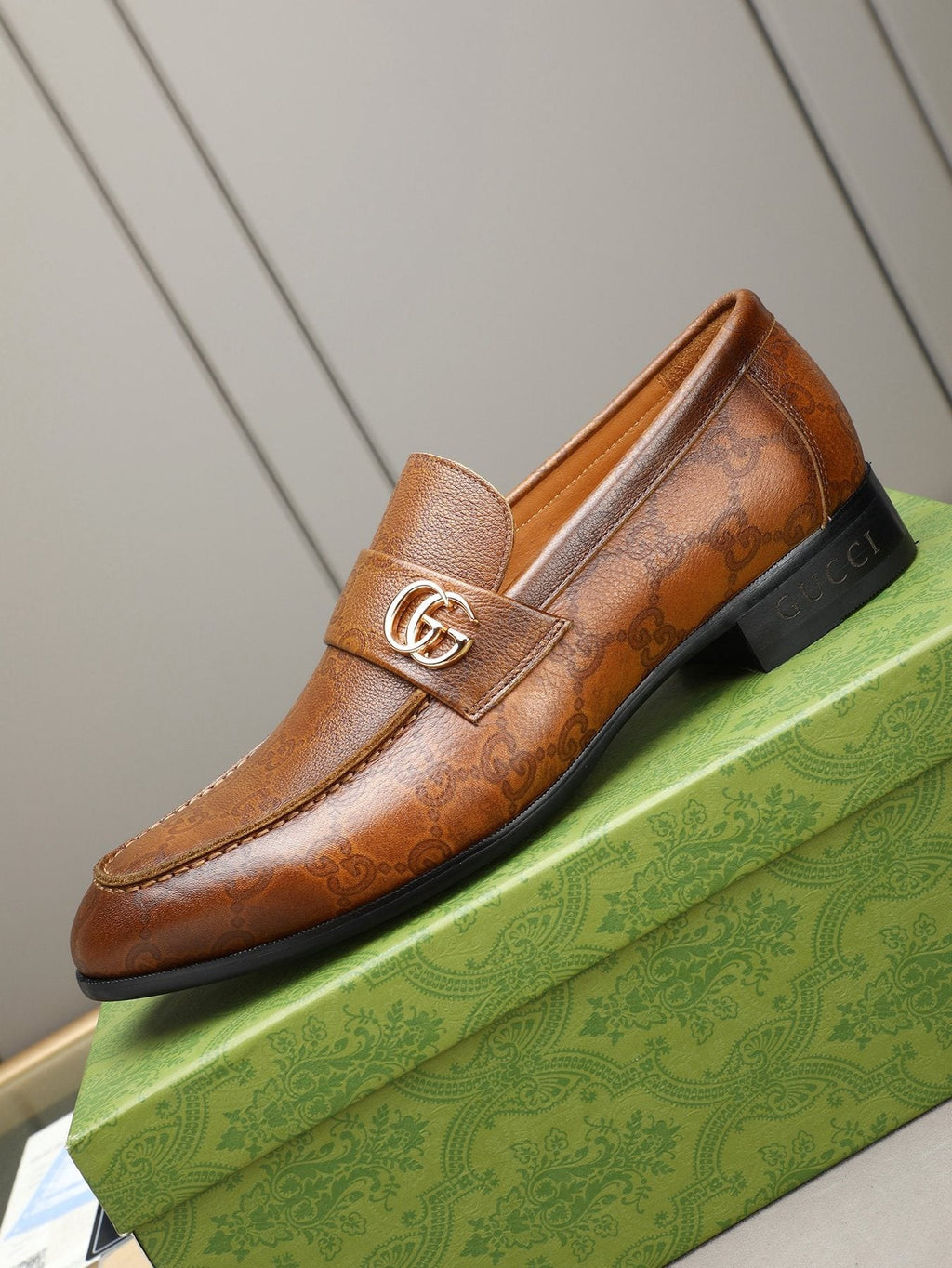 Gucci Brown Monogram Hardware Loafers — front