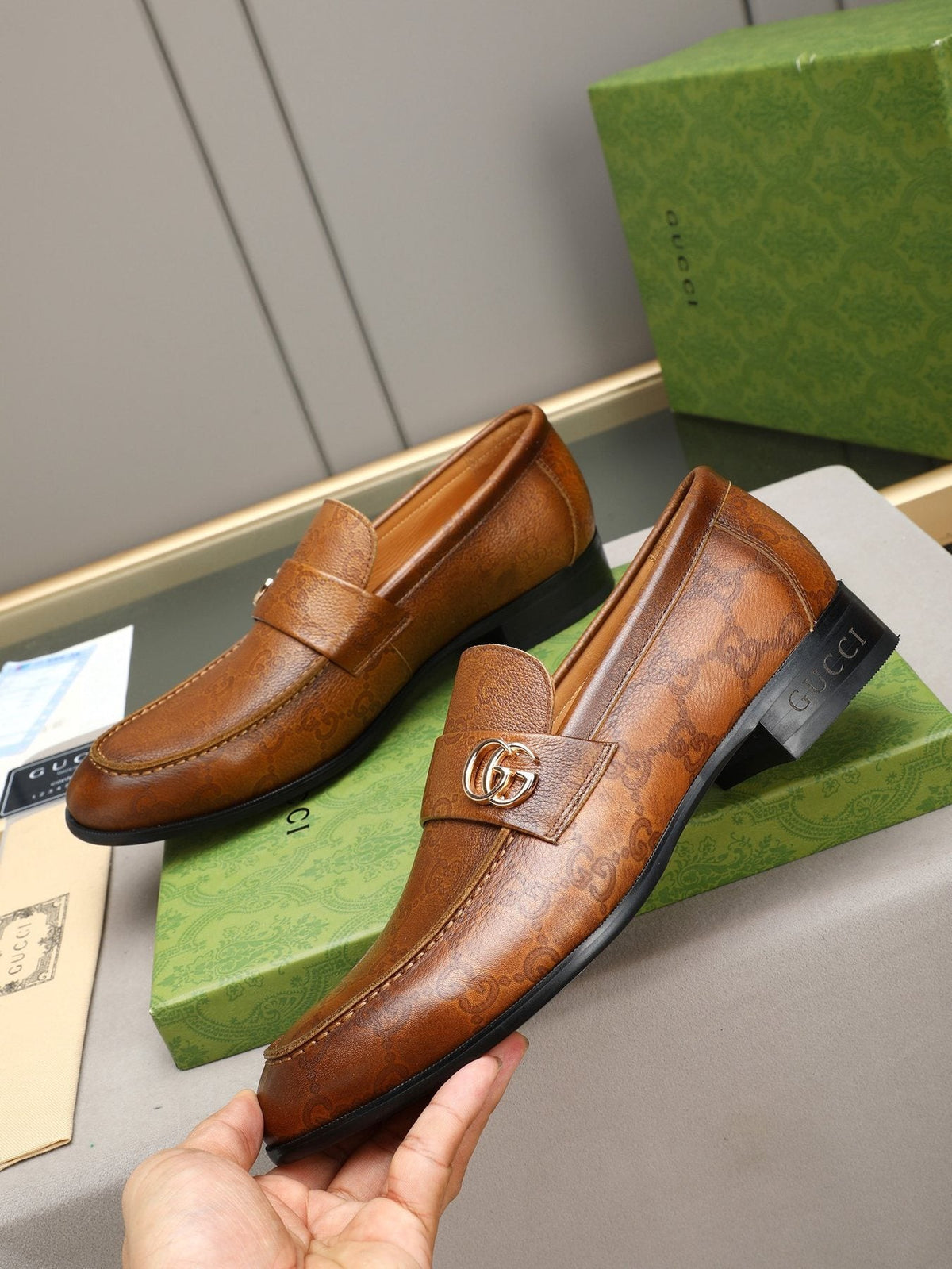 Gucci Brown Monogram Hardware Loafers — front