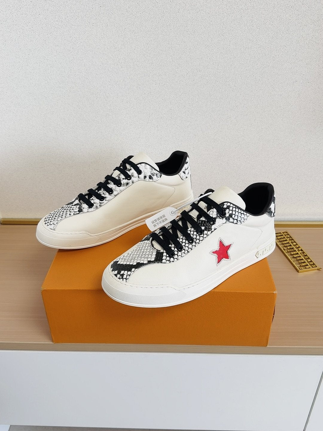 Louis Vuitton Red Star Low-Top Sneakers — front