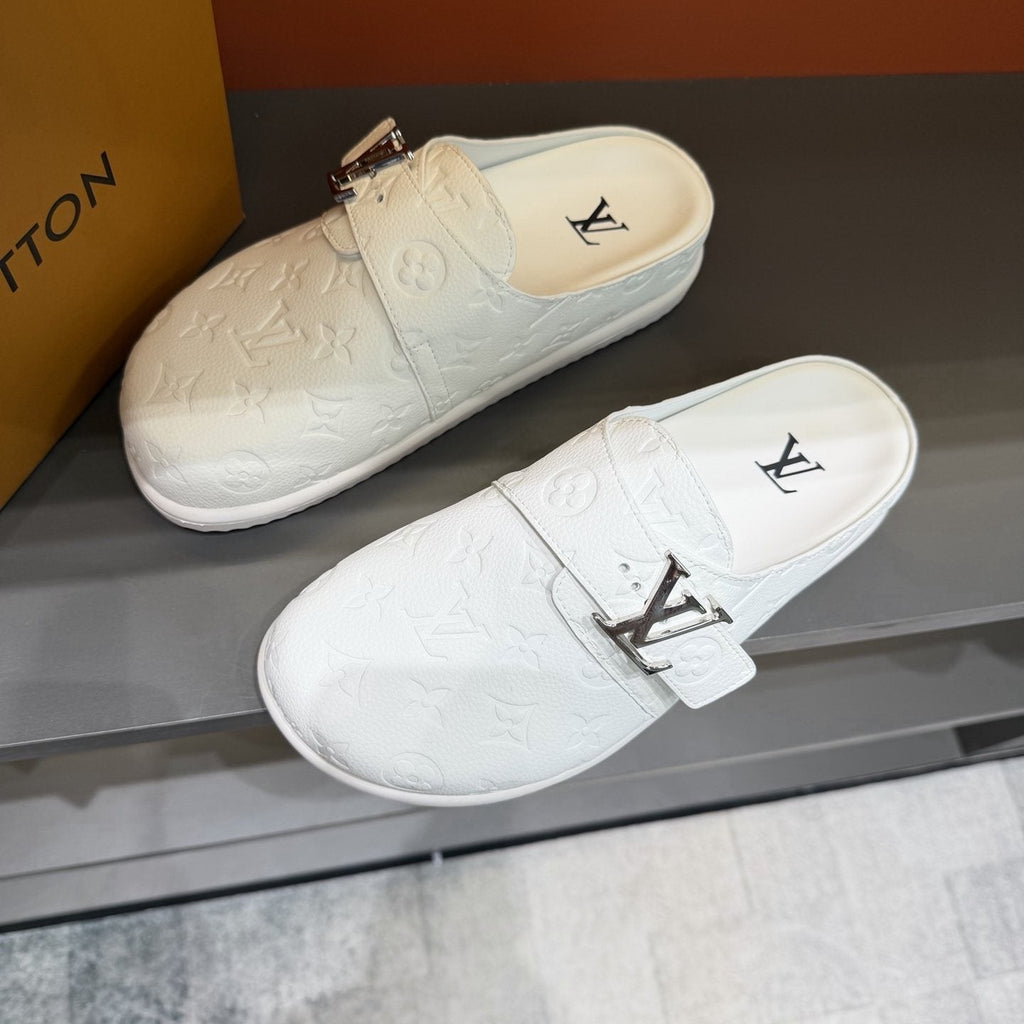 Louis Vuitton White Embossed Slide Sandals — front