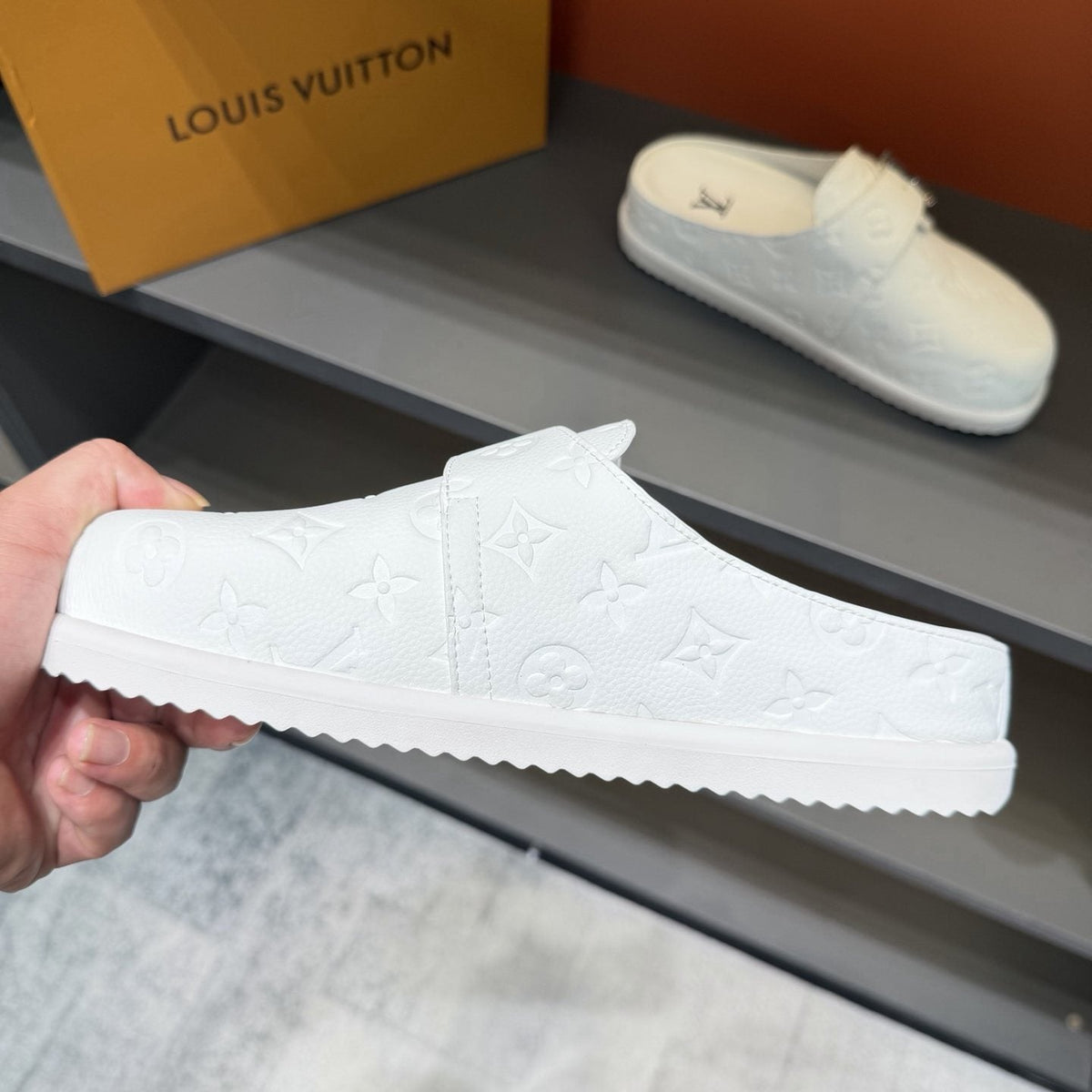 Louis Vuitton White Embossed Slide Sandals — side