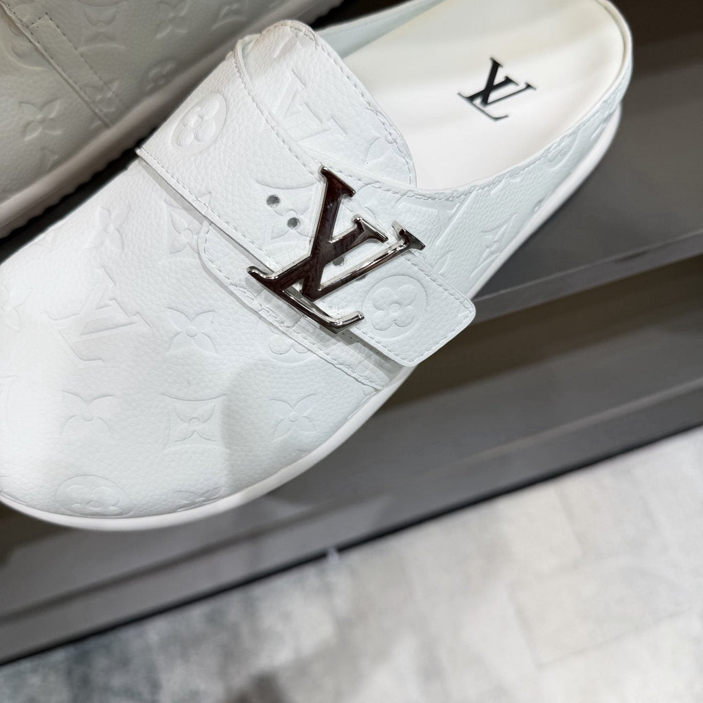 Louis Vuitton White Embossed Slide Sandals — detail