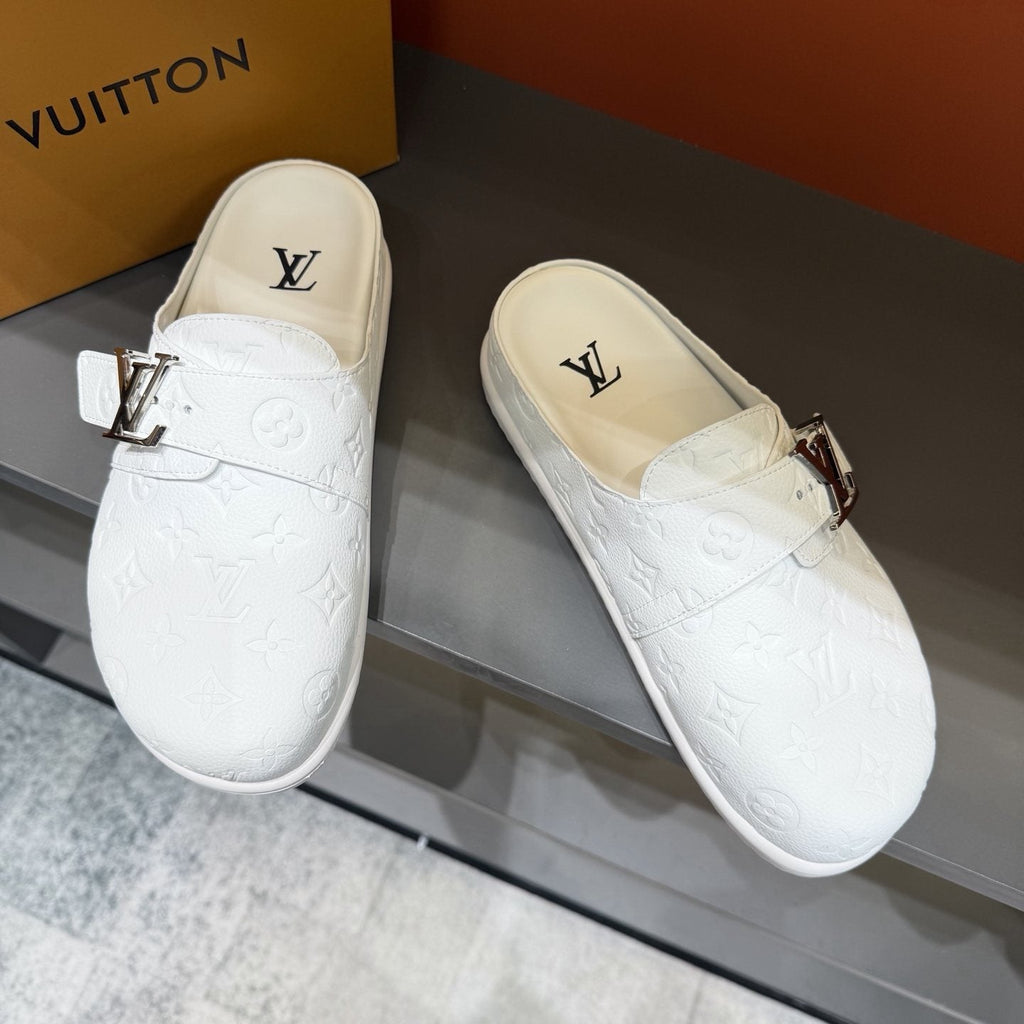 Louis Vuitton White Embossed Slide Sandals — front