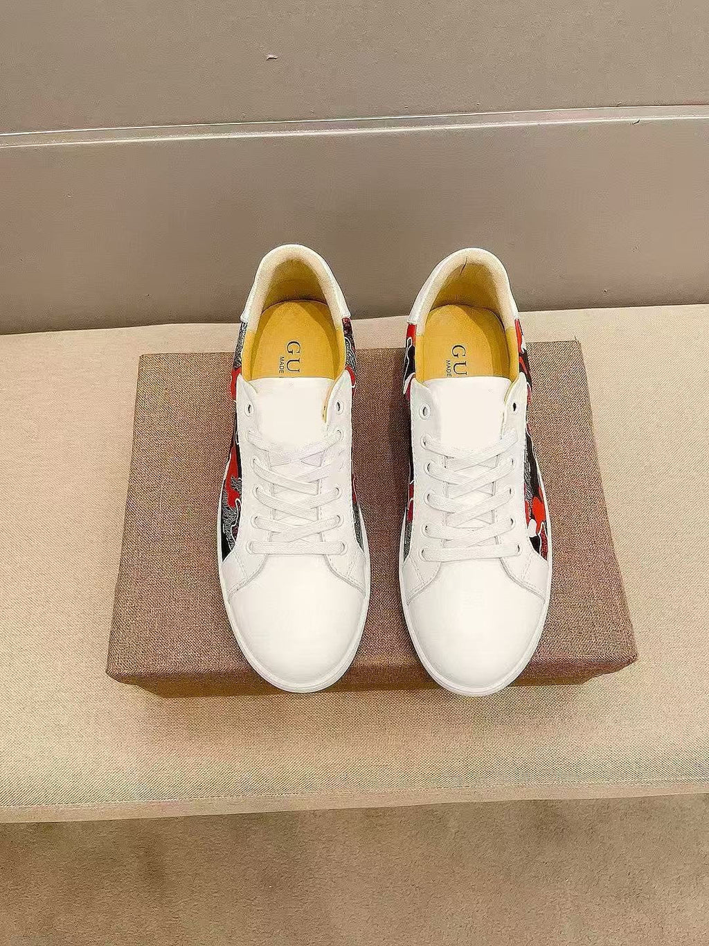 Gucci White Low-Top Sneakers with Black and Red Sides — front