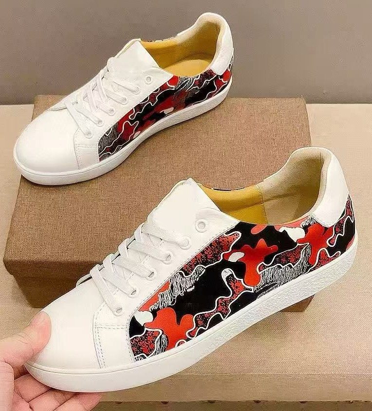 Gucci White Low-Top Sneakers with Black and Red Sides — hero