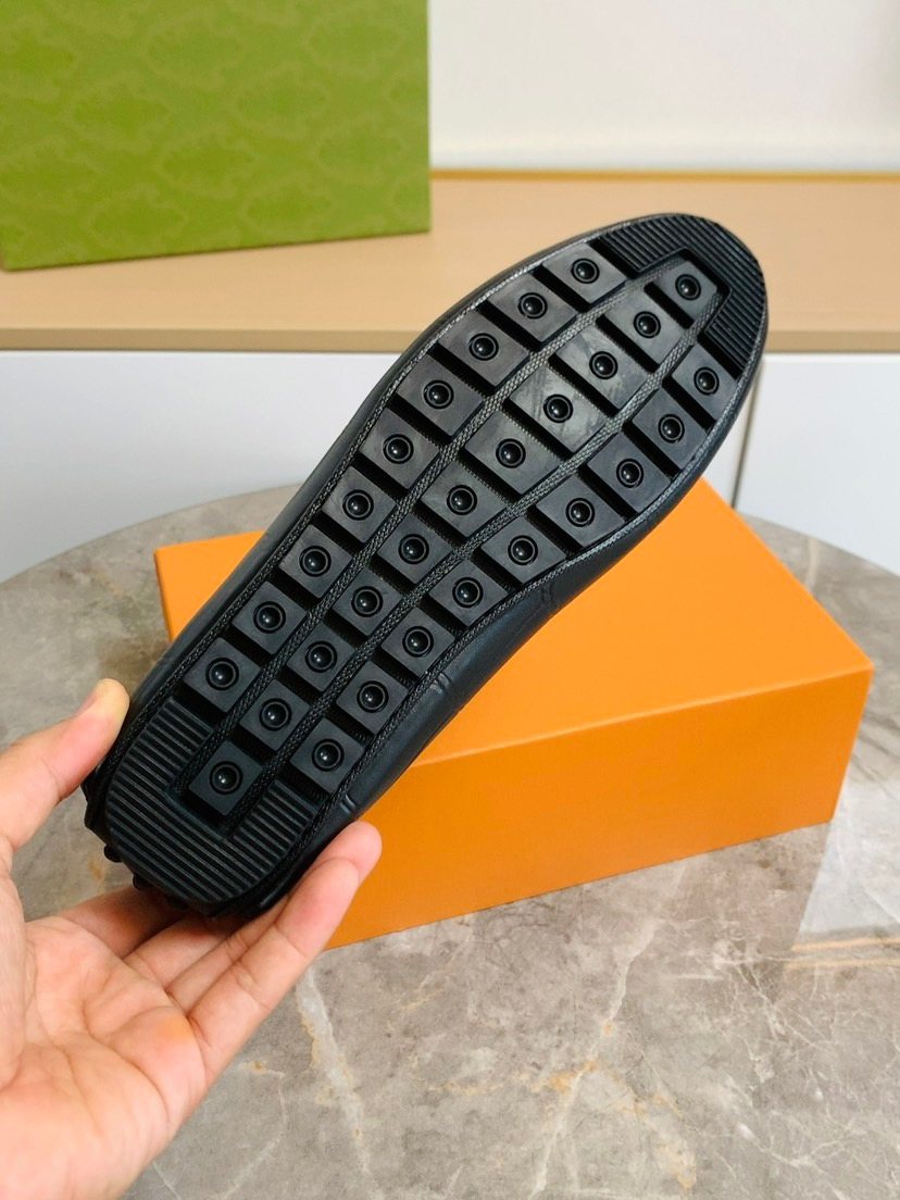 Louis Vuitton Black Leather Slip-On Loafers — detail