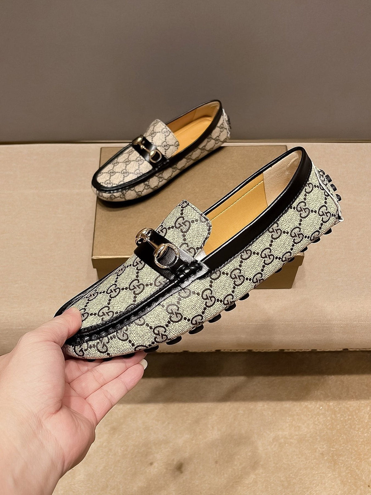 Gucci Beige and Black Gold-Hardware Loafers — front