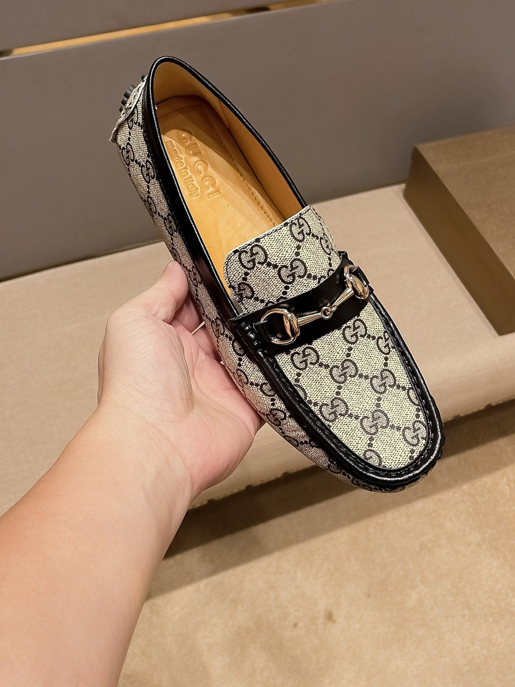 Gucci Beige and Black Gold-Hardware Loafers — front