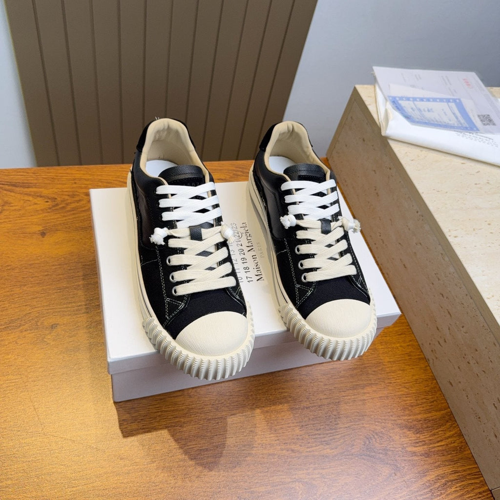 Maison Margiela Black and Off-White Low-Top Sneakers — hero