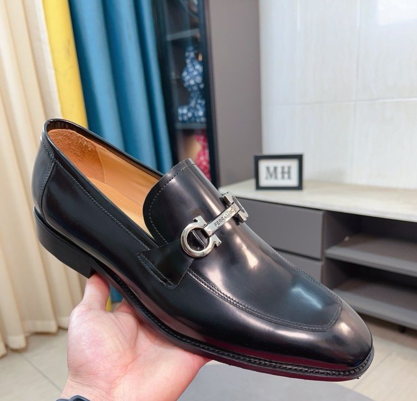 Ferragamo Black Hardware Loafers — front