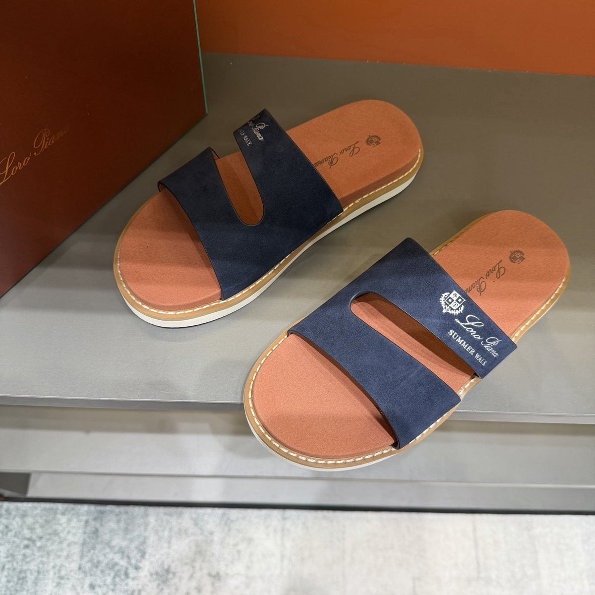 Loro Piana Navy Cutout Slide Sandals — front