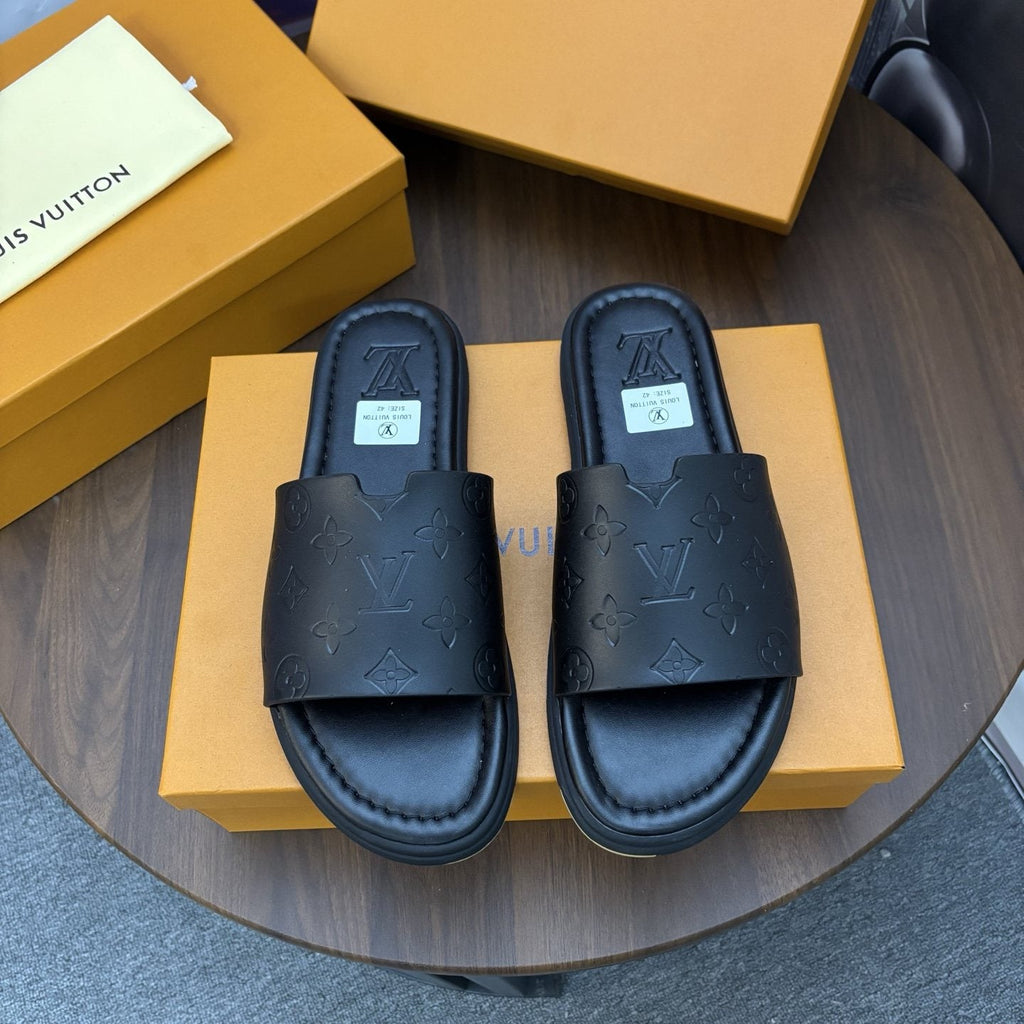 Louis Vuitton Black Embossed Slide Sandals — hero