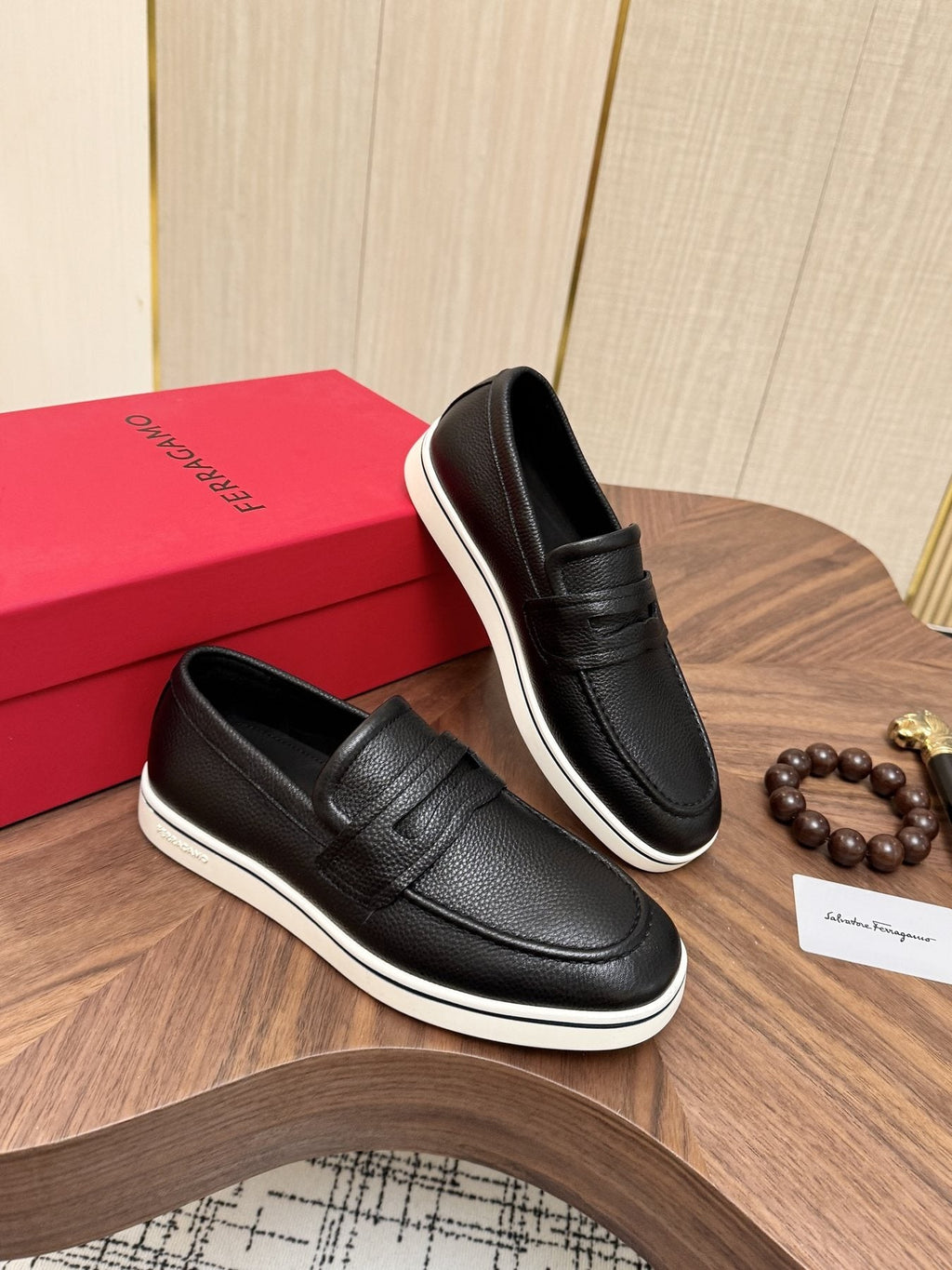 Salvatore Ferragamo Black Loafers with White Soles — front