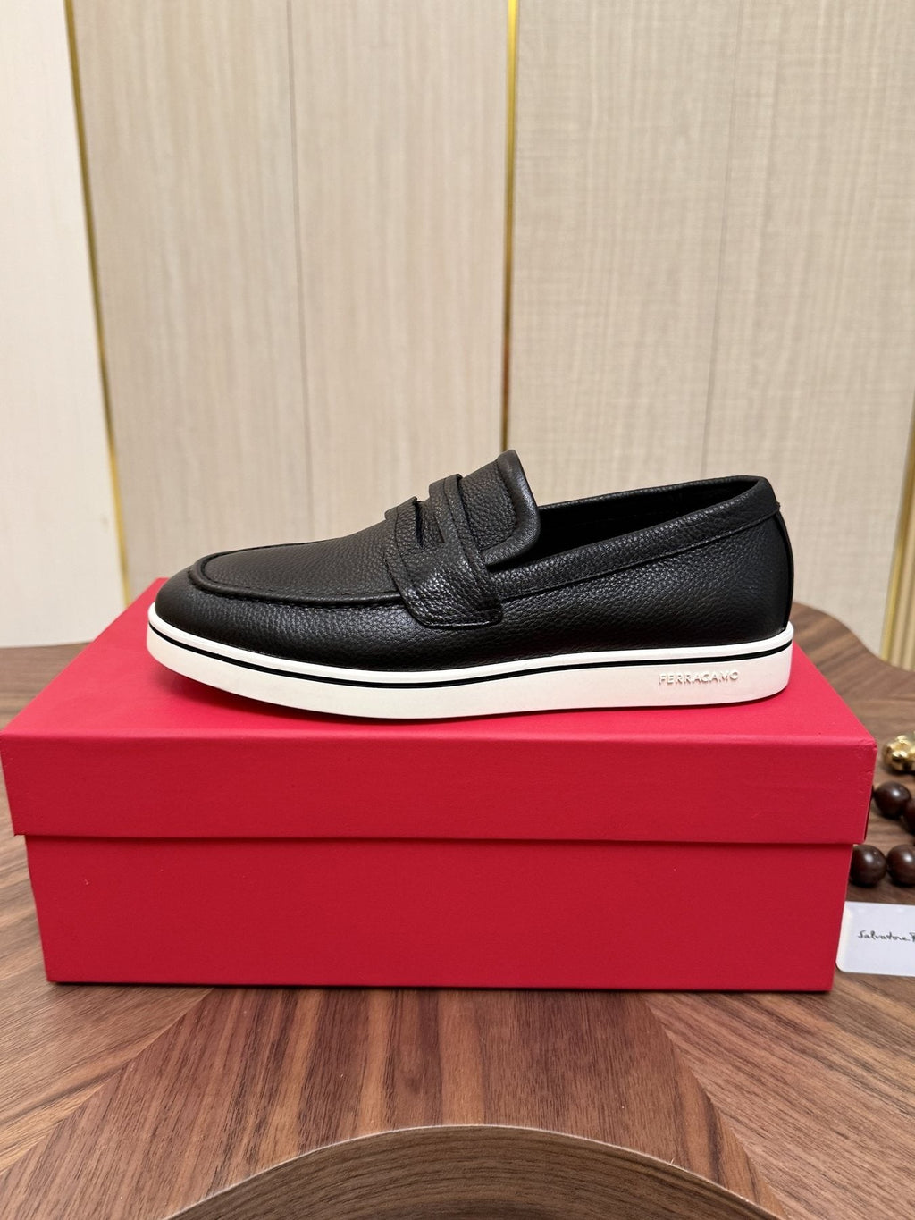 Salvatore Ferragamo Black Loafers with White Soles — side