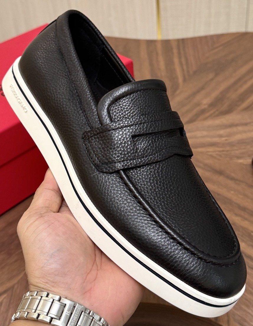 Salvatore Ferragamo Black Loafers with White Soles — front