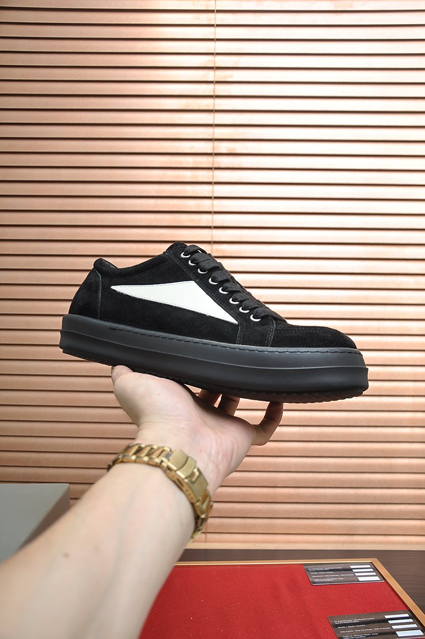 Rick Owens Black Low-Top Sneakers with White Side Panels — model