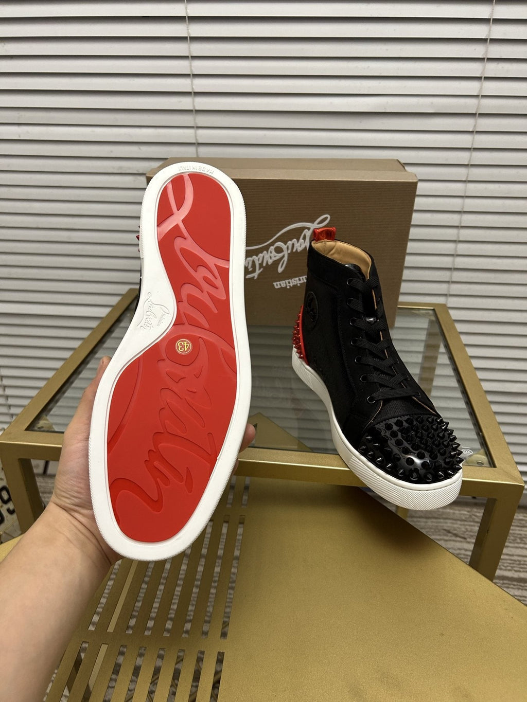Christian Louboutin Perforated Toe High-Top Sneakers — detail