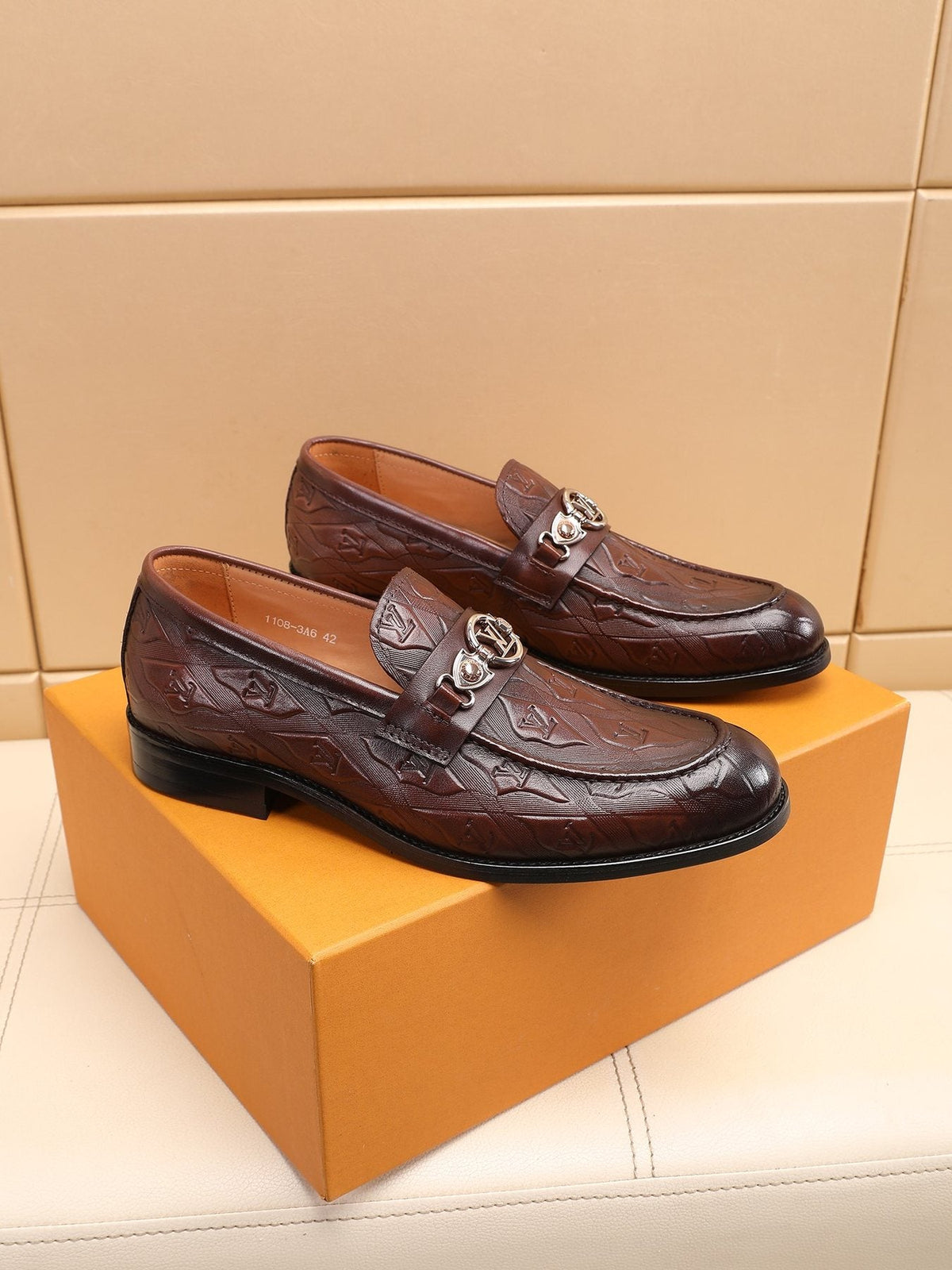 Louis Vuitton Dark Brown Embossed Loafers — front