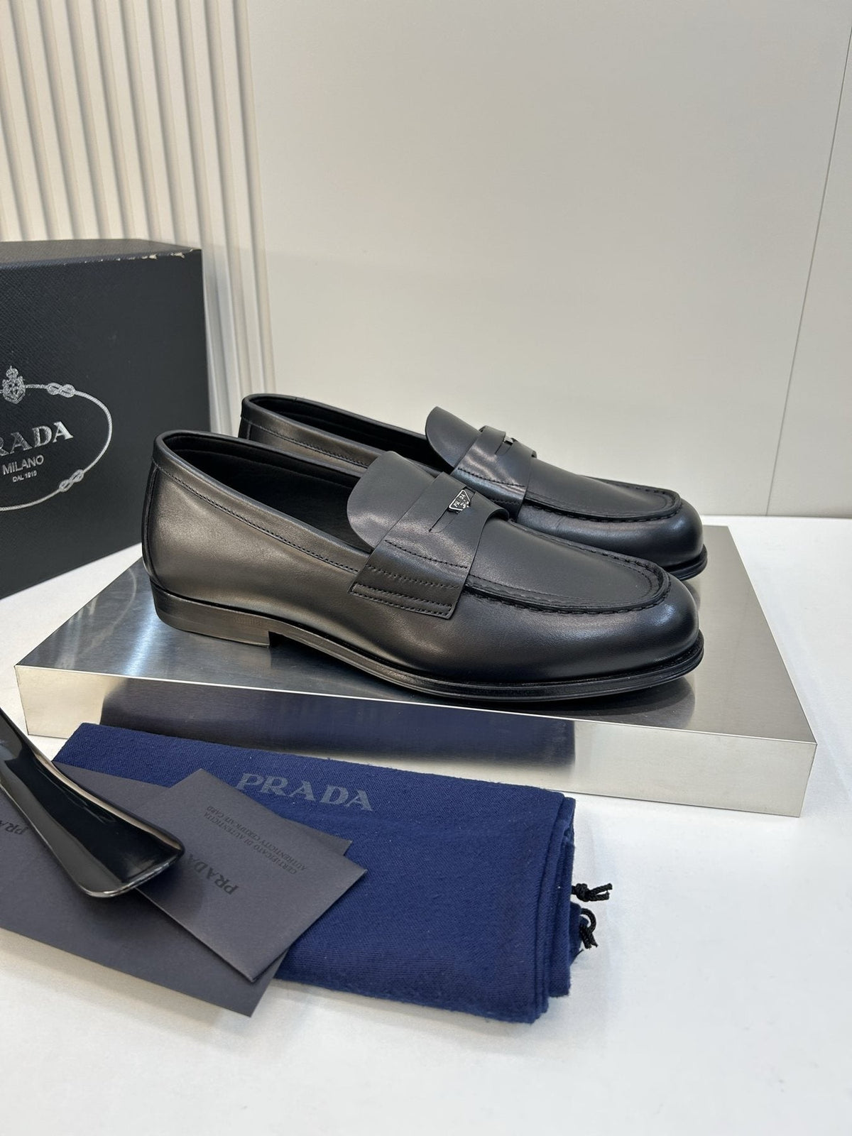 Prada Black Leather Penny Loafers — side