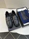Prada Black Leather Penny Loafers — hero