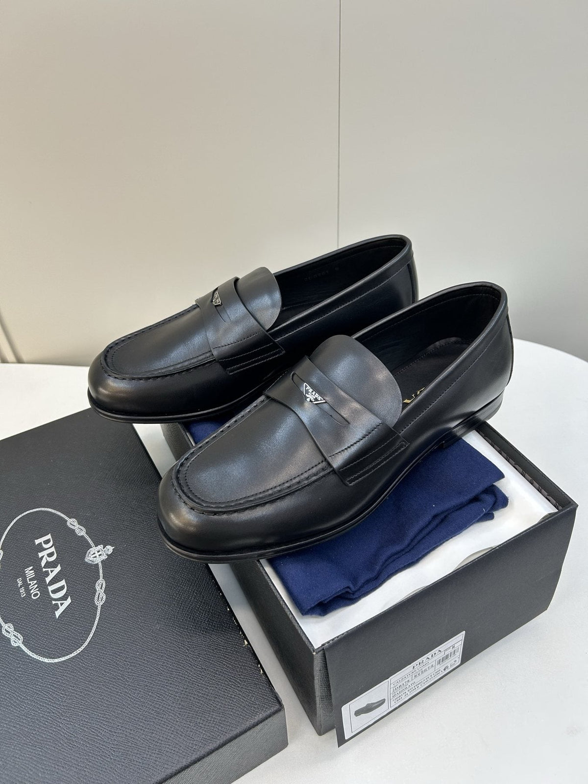 Prada Black Leather Penny Loafers — front