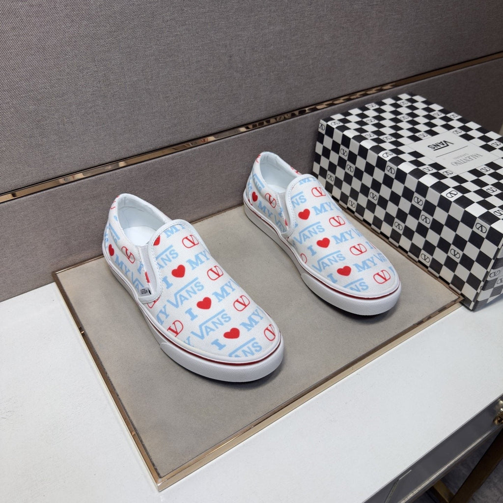 Vans White Graphic Low-Top Sneakers — front