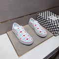 Vans White Graphic Low-Top Sneakers — front