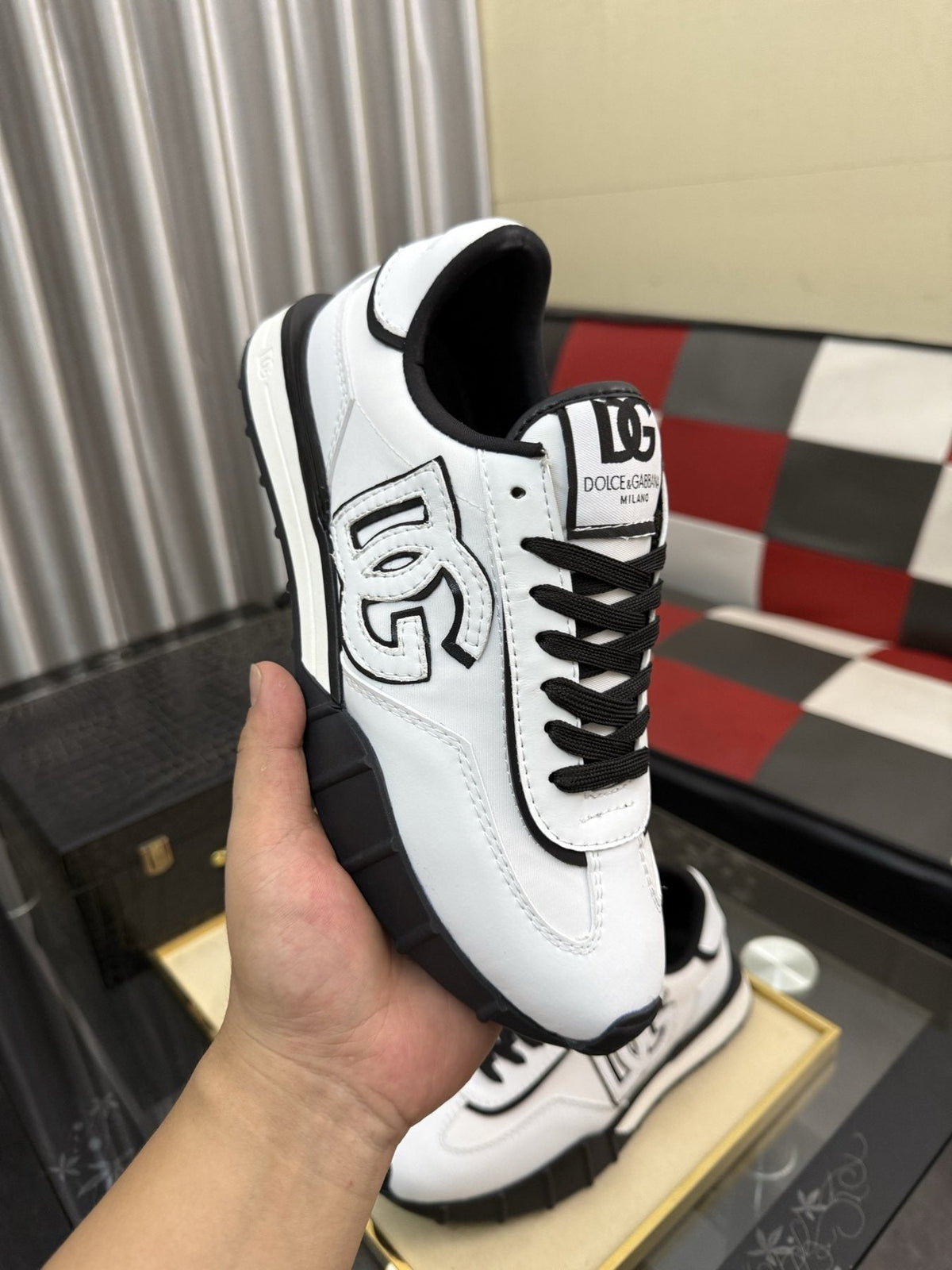 Dolce & Gabbana White and Black Segmented-Sole Sneakers — model