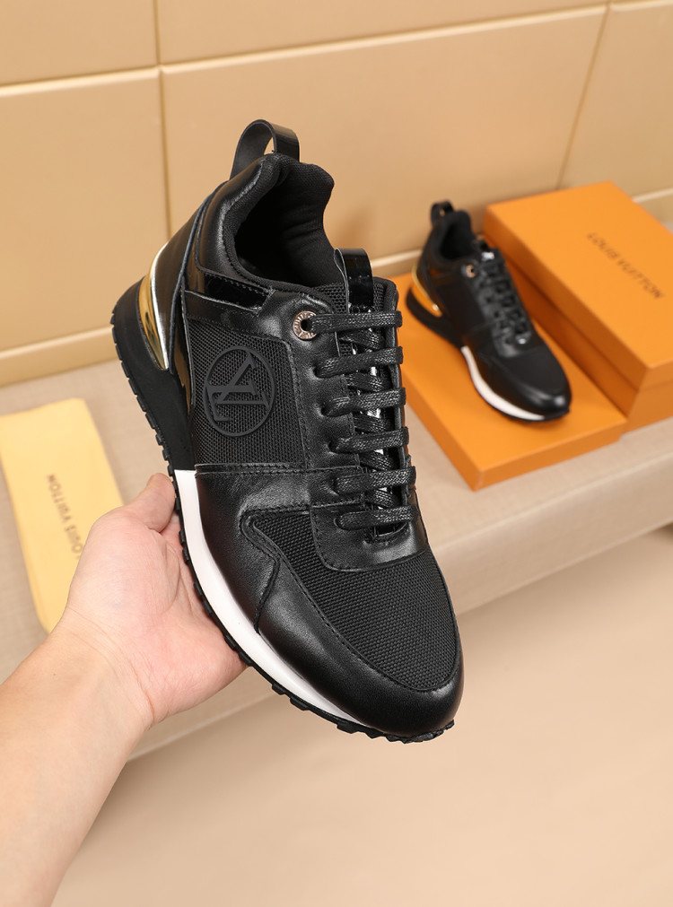 Louis Vuitton Black Gold Accent Sneakers — model